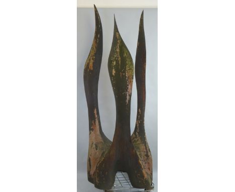 An oak free form sculpture by Malcolm MacLachlan, of Tibthorpe, East Yorkshire, carved from a single trunk in the form of thr