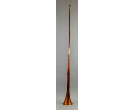 A copper and brass coaching horn, inscribed "V R Lincoln Coach", 125.5cm long 