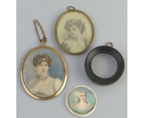 An oval miniature on ivory, head and shoulder portrait of a young lady in yellow metal frame, 7cm high, an oval pencil miniat