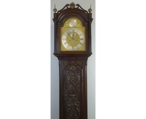 A 19th Century longcase clock, the eight day movement having arched brass dial inscribed Wm Godfrey Winterton, with silvered 