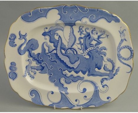 A Royal Worcester meat plate, of rounded oblong form transfer printed in blue and white with a four clawed dragon, 36.5cm lon
