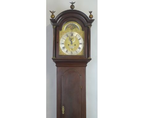 A late 18th Century longcase clock, the eight day movement having arched brass dial with rolling moon phase, subsidiary secon