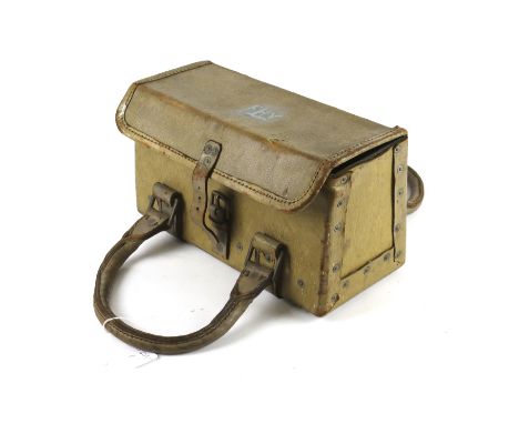 A vintage travelling case. Coloured light brown, with leather handles, L34cm