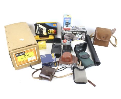 An assortment of vintage cameras and photographica. Including a disc camera, Johnson Jumbo Postcard Enlarger, etc. some items