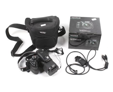 A Fuji Finepix S8500 digital camera and carry case. The camera in the original box