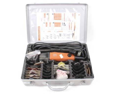A Fein Multi-master electric tool. Model no. MSxe 636 II. In a fitted case with 10 attachments and sanding pads. 240v Conditi