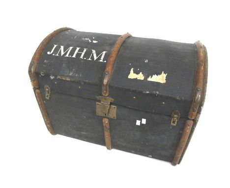 A vintage dome top trunk. With wooden and leather bindings, stamped 'J.M.H.M.' to the top, L76cm