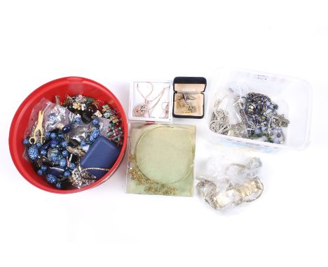 An assortment of costume jewellery. Including a multi-gem bracelet stamped '925', a small rolled-gold Latin cross and chain; 