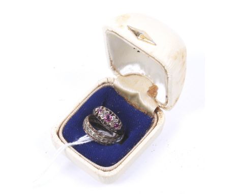 Two gold and gem set rings. Comprising; An Edwardian 18ct gold, ruby and rose diamond ring, the three graduated rubies spaced