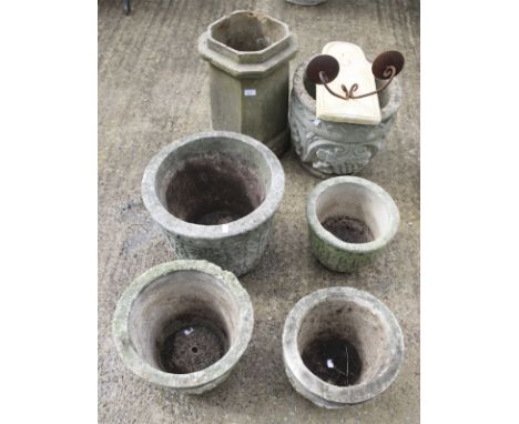 Five composite stone garden pots, a chimney and a wall light bracket. The pots with moulded details, Max. H52cm