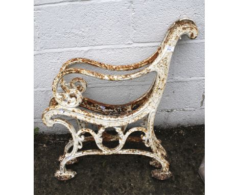A pair of Victorian cast metal bench ends. Painted white with scroll details, H79cm