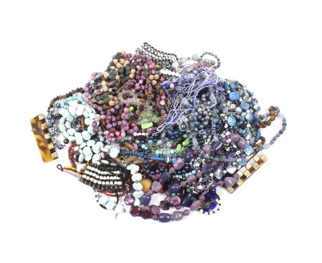 A large collection of miscellaneous costume jewellery. Including a beaten-copper panel necklace, a similar broad torque bangl