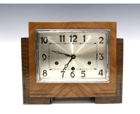 An Art Deco mantle clock, walnut case with silvered dial, 24cm 