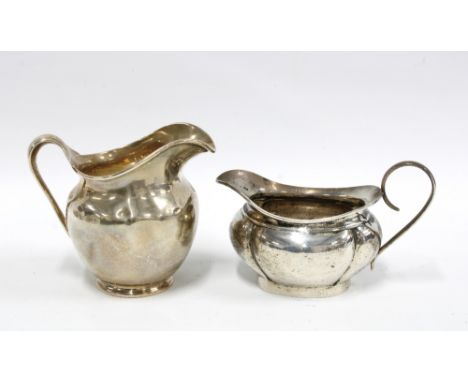 George V silver sauce boat, London 1925 and a Birmingham silver sauce boat (2) 