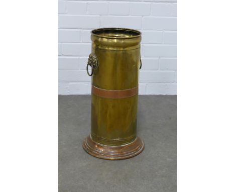 Brass and copper banded stick stand with lion mask ring handles, 26 x 48cm. 