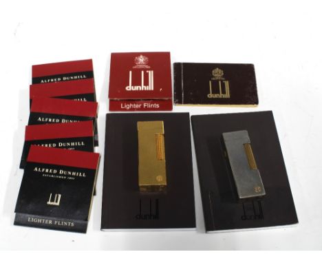 Two vintage Dunhill lighters and a collection of Dunhill flints, etc 