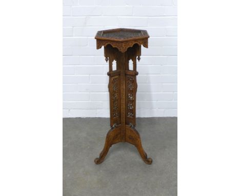 Burmese Anglo-Indian jardiniere plant stand, with hexagonal top, carved and pierced throughout with elephant trunk legs,  30 