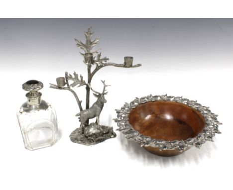 Stag pewter candelabra, fruitwood bowl with pewter rim and a glass decanter with pewter mounts and stopper (3) 