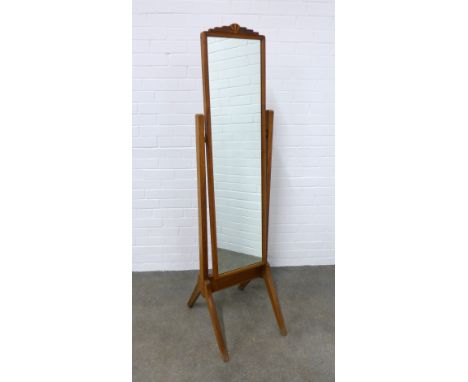 M. HAYAT &amp; BROS LTD PESHWAR PAKISTAN, mahogany cheval mirror, the top rail with an inlaid Art Deco fan motif, on splayed 