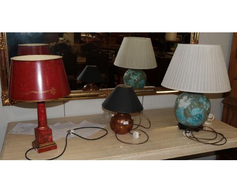 A modern ceramic table lamp decorated with flowers and butterflies with shade, a modern red and gilt decorated Toleware style