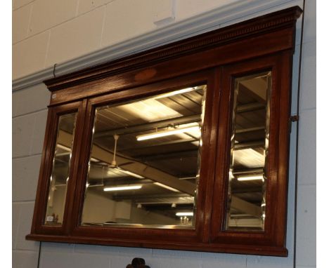An inlaid mahogany sectional over mantel mirror, 74cm by 131cm 