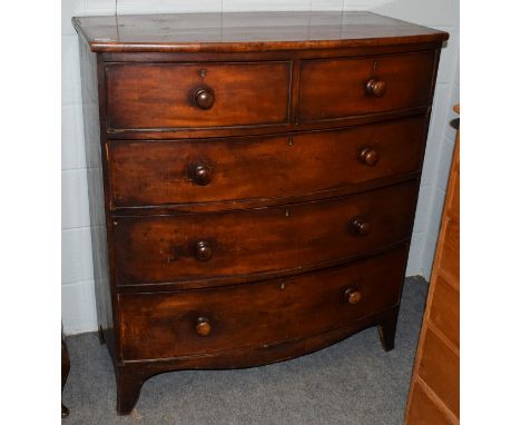 A Victorian mahogany bow-front four-height chest of drawers 