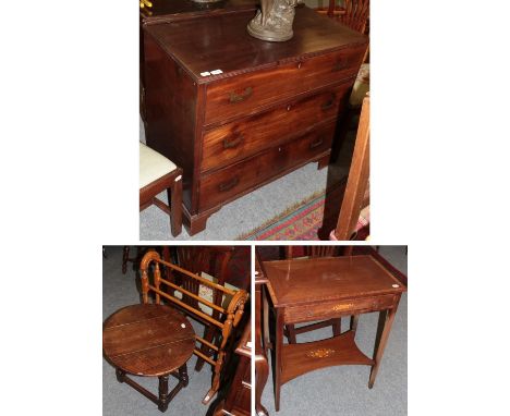 A mahogany chest of drawers, the rectangular top hinged and above a dummy drawer, over two long drawers, 92cm by 47cm by 83cm