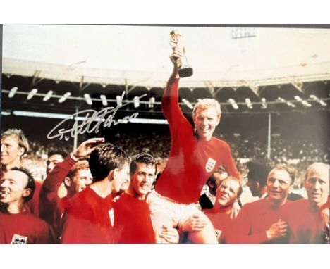 Geoff Hurst 18x12 inch signed England 1966 World Cup Final photo picturing the iconic image of Booby Moore being shouldered b