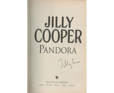 Jilly Cooper signed first edition hardback book titled Pandora signature on the inside title page. 558 pages. Good condition 