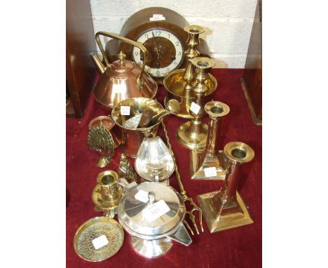 A Junghans oak-cased chiming mantel clock, 19.5cm high, a copper and brass kettle, two pairs of brass candlesticks, other bra