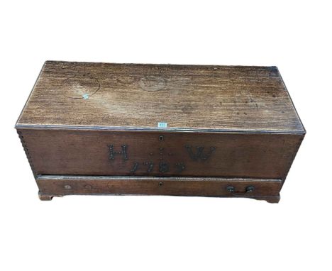 Antique oak trunk with base drawer, studded H W 1789, 44cm by 102cm by 42cm.