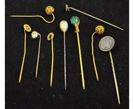 A collection of variously mounted Stick Pins.