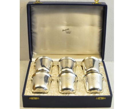 A set of six Swedish silver Tumblers, with gilded interiors and engraved with a monogram, hallmark for 1949, cased and three 