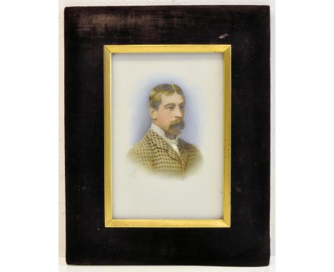 *  A miniature head and shoulders Portrait of a Gentleman wearing a patterned tweed coat, facing half right, signed with a mo