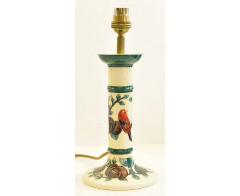 A Moorcroft Plum pattern Candlestick Lamp on an ivory ground.  11" (28cms) tall, without shade.