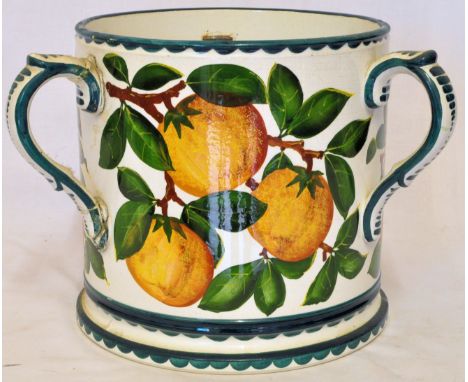 *  A large Robert Heron Wemyss Tyg painted with fruit, and the retailer's mark of 'T Goode of London', 9 1/2" (24cms) diamete