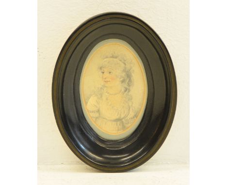 A miniature oval Portrait of 18th century Lady, half length, in an ebonised frame, inscribed on the reverse "Watnaby Family",