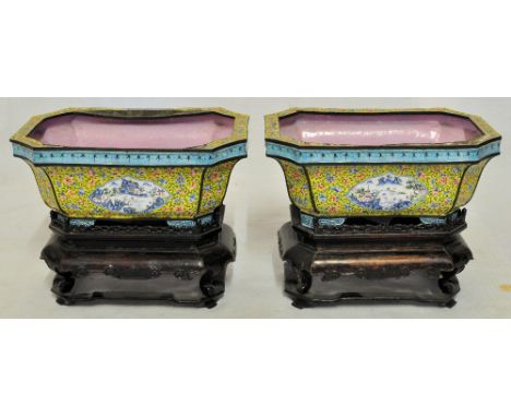 *  A pair of Cantonese enamel Flower Troughs, decorated with panels of Chinese landscapes on a floral yellow ground and on ha