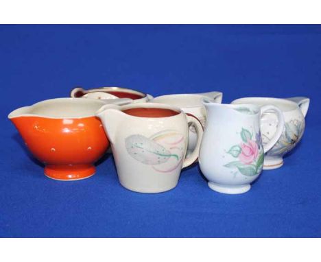 LARGE SELECTION OF SUSIE COOPER TEA WARE
including a colletion of milk jugs in various designs and patterns, together with a 