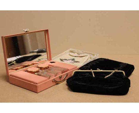 1960s SIRRAM VANITY CASE
the pink fitted mirrored interior housing three bottles, two jars and two lidded compartments, 22cm 