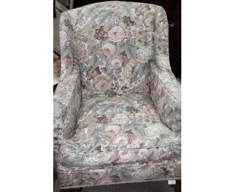 WINGBACK ARMCHAIR 
upholstered in floral print fabric 