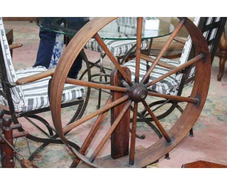 EARLY 20TH CENTURY YARN BALL WINDER
with bentwood wheel and spinner on four legs; together with a loom bobbin (2)