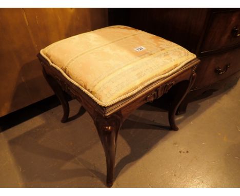 Upholstered stool on cabriole legs