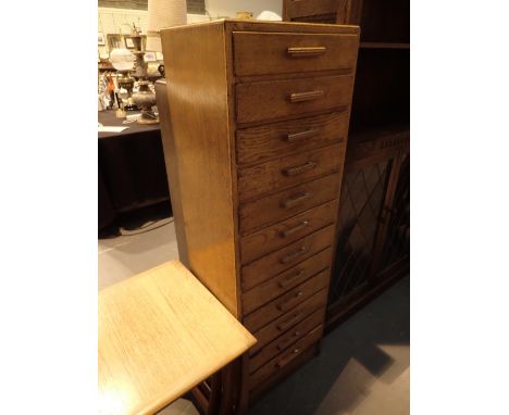 Narrow set of twelve oak drawers with mother of pearl inlay to handles 44 x 33 x 130 cm H