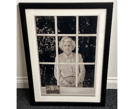 Framed portrait photograph of Nanza Hughes. Overall size including frame 76cm x 56cm. This is her story: "I was a wireless op