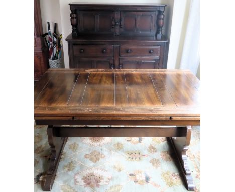 Ercol style oak court cupboard plus similar draw leaf table