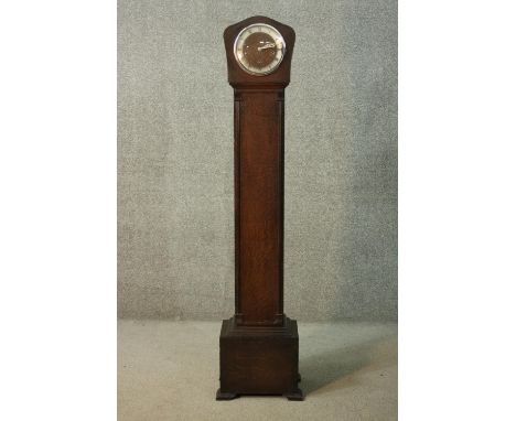 A mid century Art Deco style oak cased Enfield clock company chiming Grandmother clock. H.143 W.30cm. 