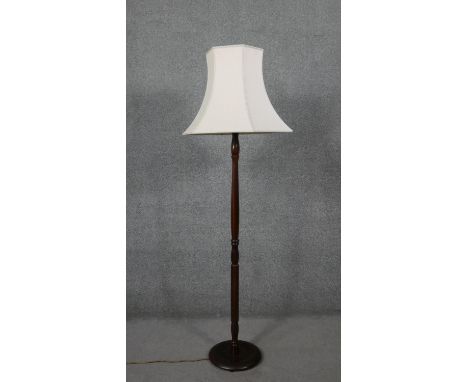 A vintage standard lamp with cream silk shade. H.170 W.60cm 