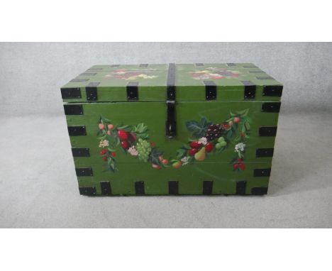 A 19th century metal bound trunk with painted decoration and twin carrying handles. H.65 W.104 D.60cm 