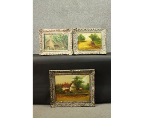 Two carved wood foliate design framed oils on board and a watercolour. Two of countryside cottages and one of a country lane.